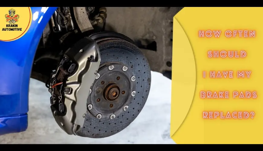 Mechanic inspecting brake pads during vehicle service at Krakin Automotive Gold Coast